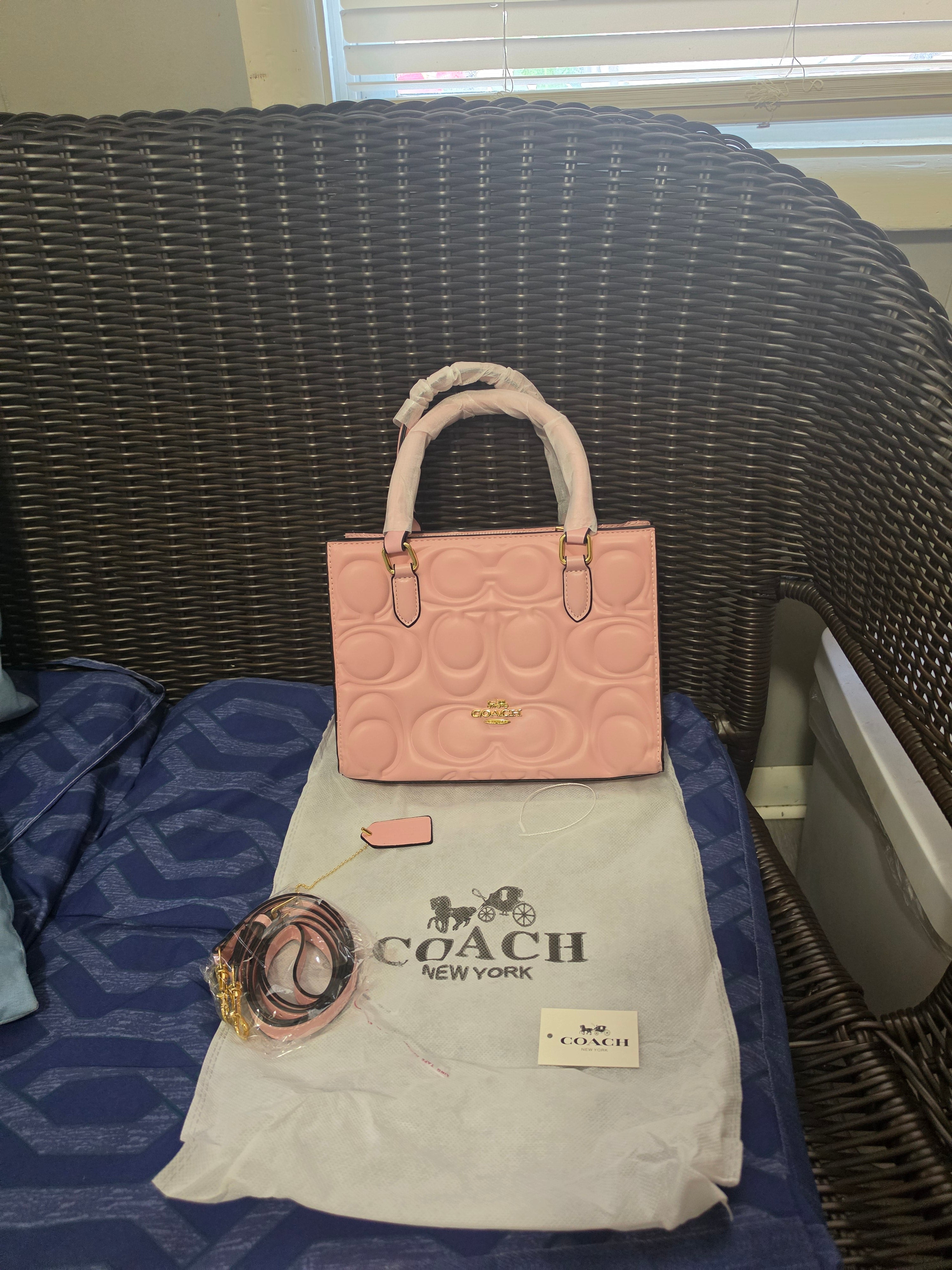 Cartera coach mediana