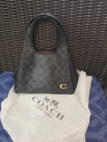 Cartera coach mediana