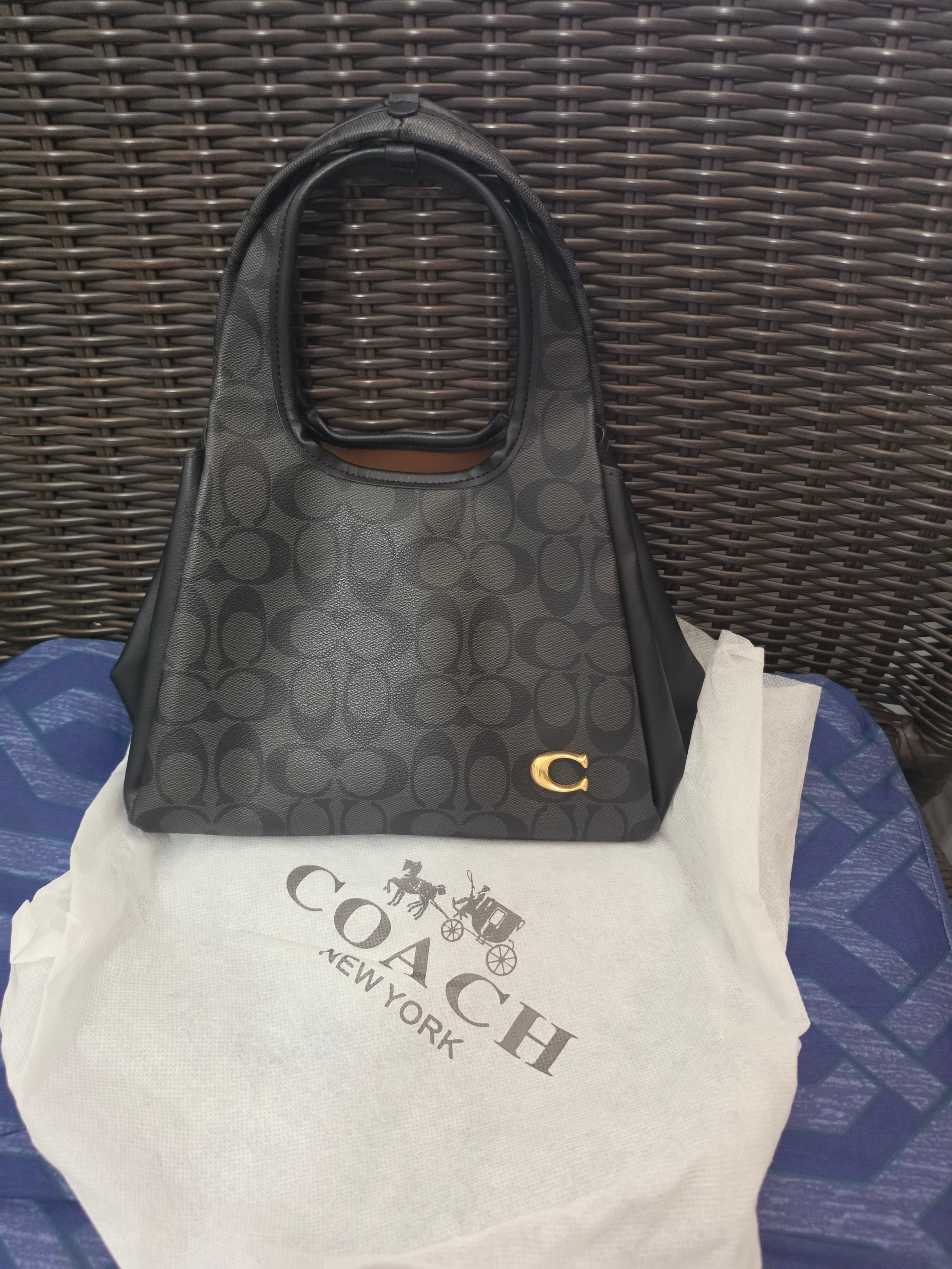 Cartera coach mediana
