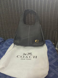 Bolsa coach mediana