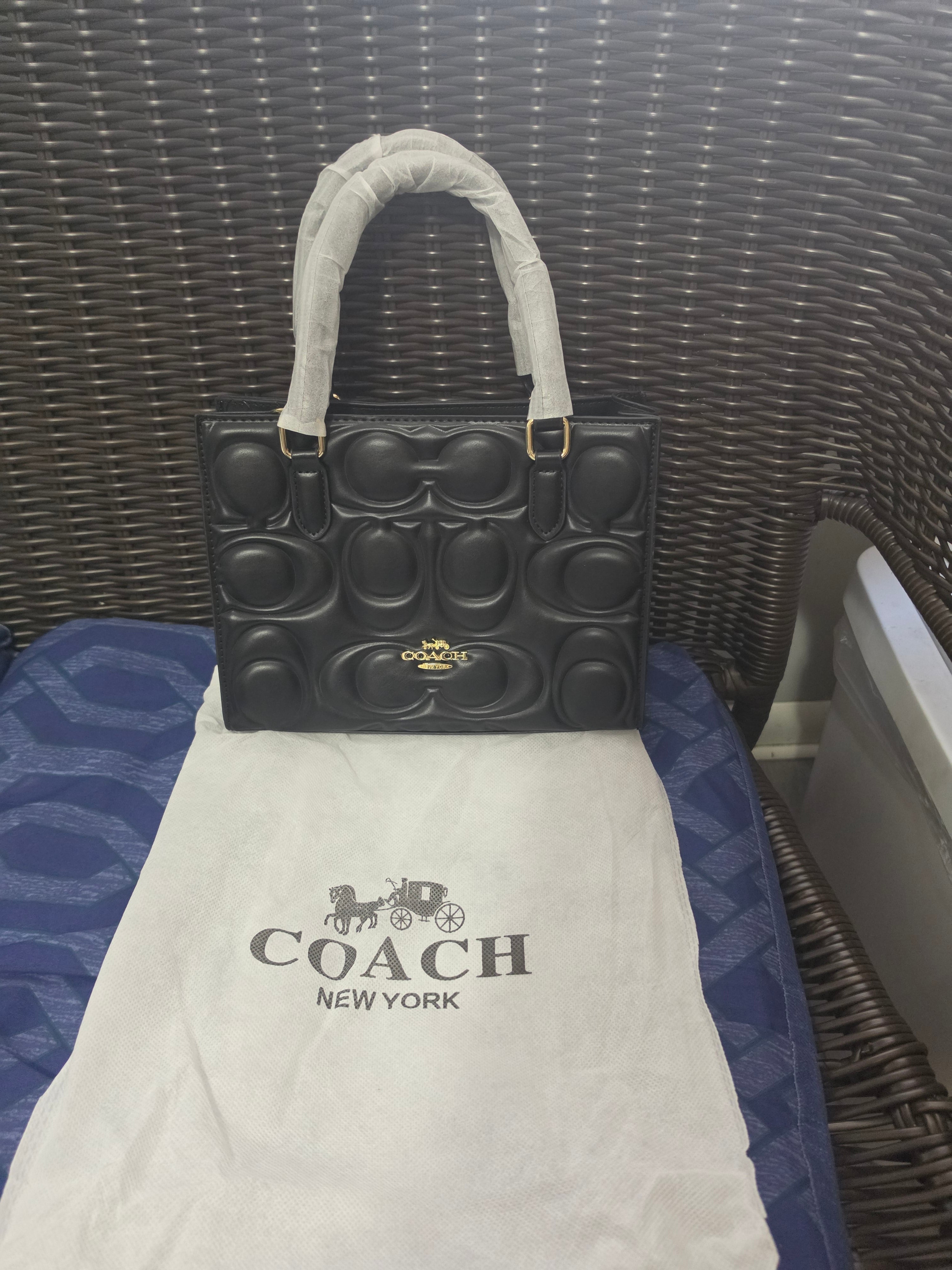 Cartera mediana coach